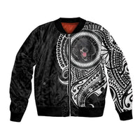 Black bomber jacket with large white poodle dog graphic and tribal pattern sleeves