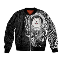 Black unisex bomber jacket with white dog face and Polynesian-style tribal print