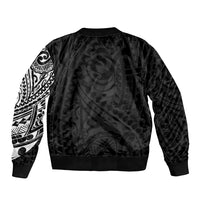 Black unisex bomber jacket with Polynesian-style tribal print sleeves, solid back