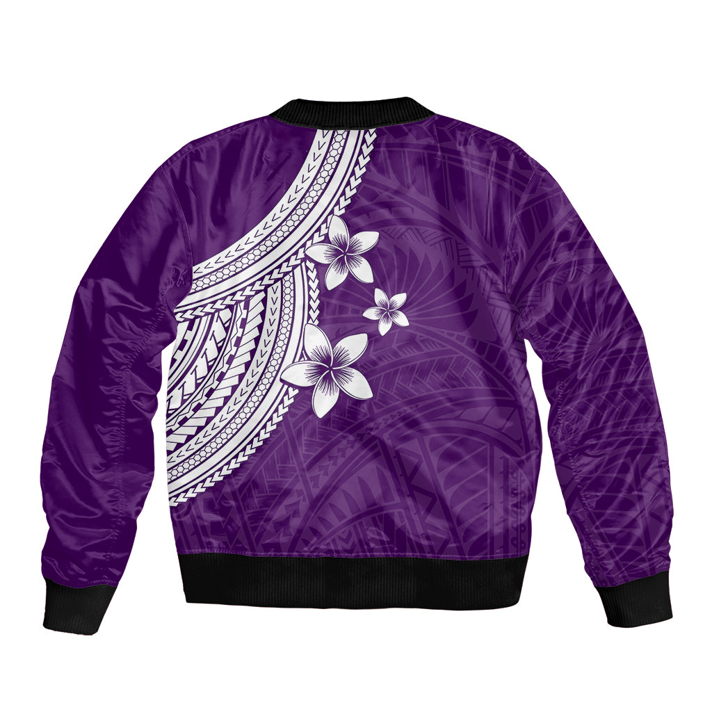 Purple bomber jacket back with white plumeria flowers and tribal-style patterned yoke, rib hem