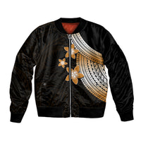 Black satin bomber jacket with front zipper, ribbed cuffs, gold plumeria and tribal stripe panel