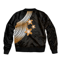 Black bomber jacket back with gold plumeria flowers and tribal geometric stripe graphic