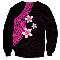 Unisex sweatshirt with pink plumeria and geometric pattern across dark back