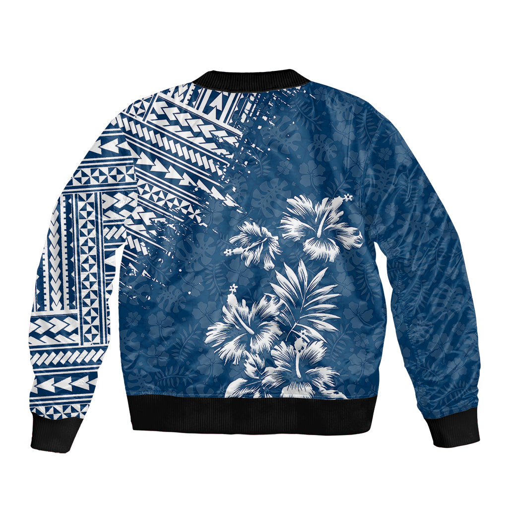 Unisex blue bomber jacket back with geometric pattern panel and large palm tree print, ribbed hem