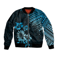 Unisex bomber jacket in black with blue tribal print, palm flowers, front zip closure.