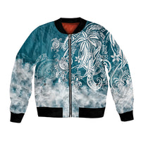 Unisex blue bomber jacket with front zipper, ribbed cuffs, and tribal sea turtle print