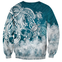 Turquoise crewneck sweatshirt with large white tribal sea turtle and wave cloud gradient