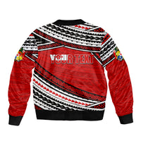 Red bomber jacket back with 'YOUR TEXT' in tribal stripe print.