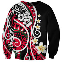 Unisex crewneck sweatshirt in black with red-and-white Polynesian floral print, long sleeves