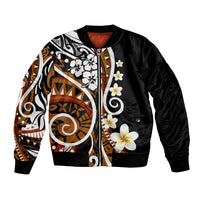 Black bomber jacket with Polynesian floral tribal graphic, ribbed cuffs and hem