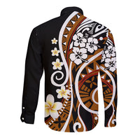 Long-sleeve button shirt with black sleeves, brown geometric stripe panels, and white floral motifs
