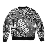 Black-and-white bomber jacket with tribal pattern, front zip, ribbed hem and cuffs