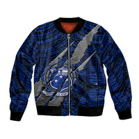 Blue bomber jacket with zip front, black ribbed hem and cuffs, claw-style emblem graphic