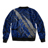 Blue bomber jacket back with black ribbed hem and cuffs, large silver claw emblem print