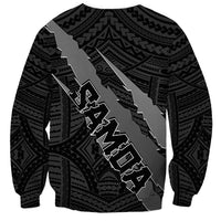 Black unisex sweatshirt with diagonal tribal text-style graphic and emblem