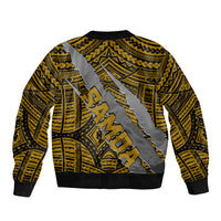Gold bomber jacket back with large tribal crest graphic and diagonal stripe design