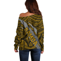 Women’s off-shoulder sweater back view with large claw crest graphic, olive and gold