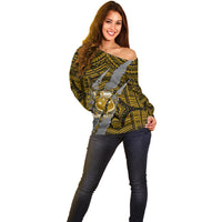 Women’s off-shoulder sweater with claw crest emblem, long sleeves, olive and gold design