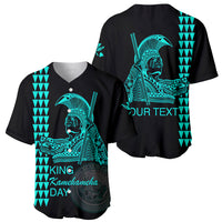 Set of black baseball jerseys with turquoise king designs on front and back