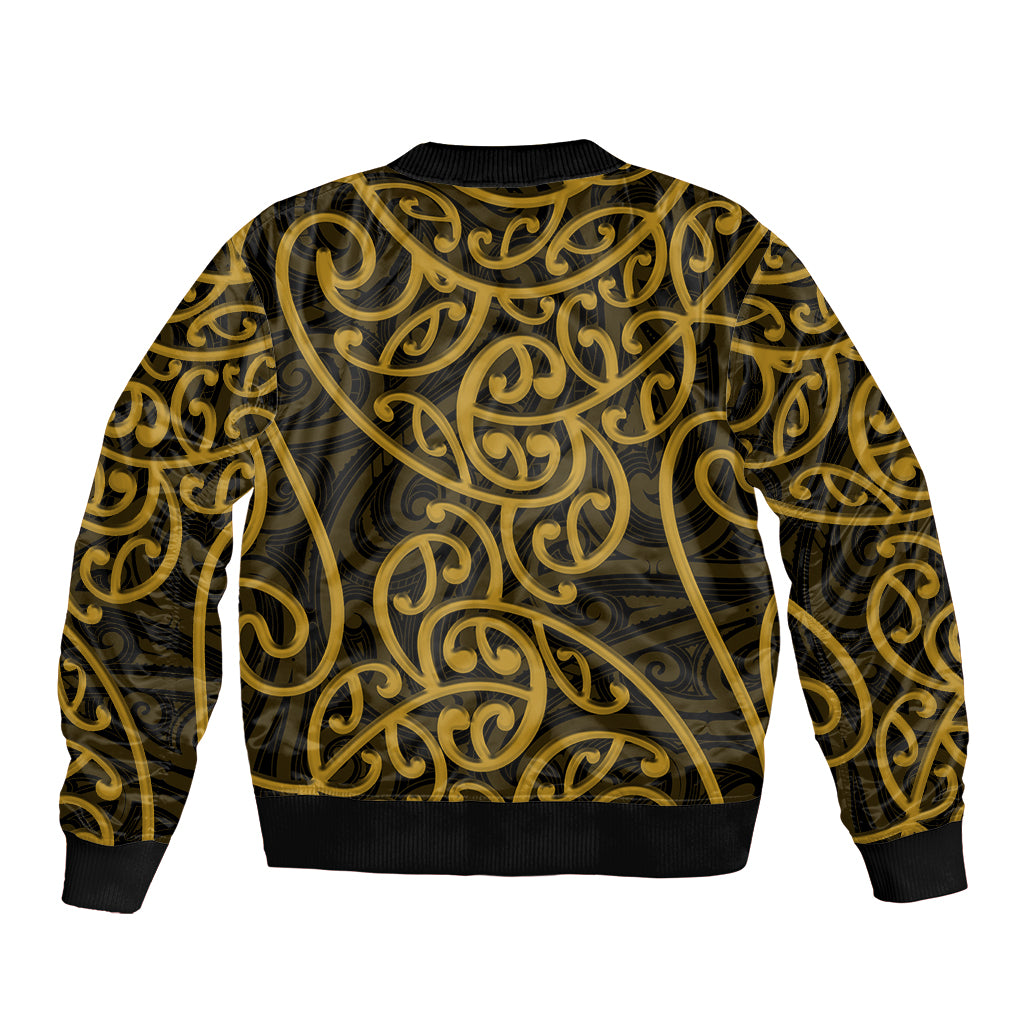 Bomber jacket with gold swirl Maori pattern, black ribbed cuffs and hem, front view