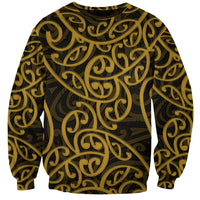 Unisex crewneck sweatshirt with gold and dark Maori swirl pattern, long sleeves