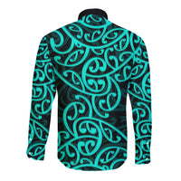 Long sleeve button shirt with turquoise Maori swirl pattern on back, black collar