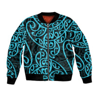 Light blue and black bomber jacket with Maori-style swirling pattern, zip front