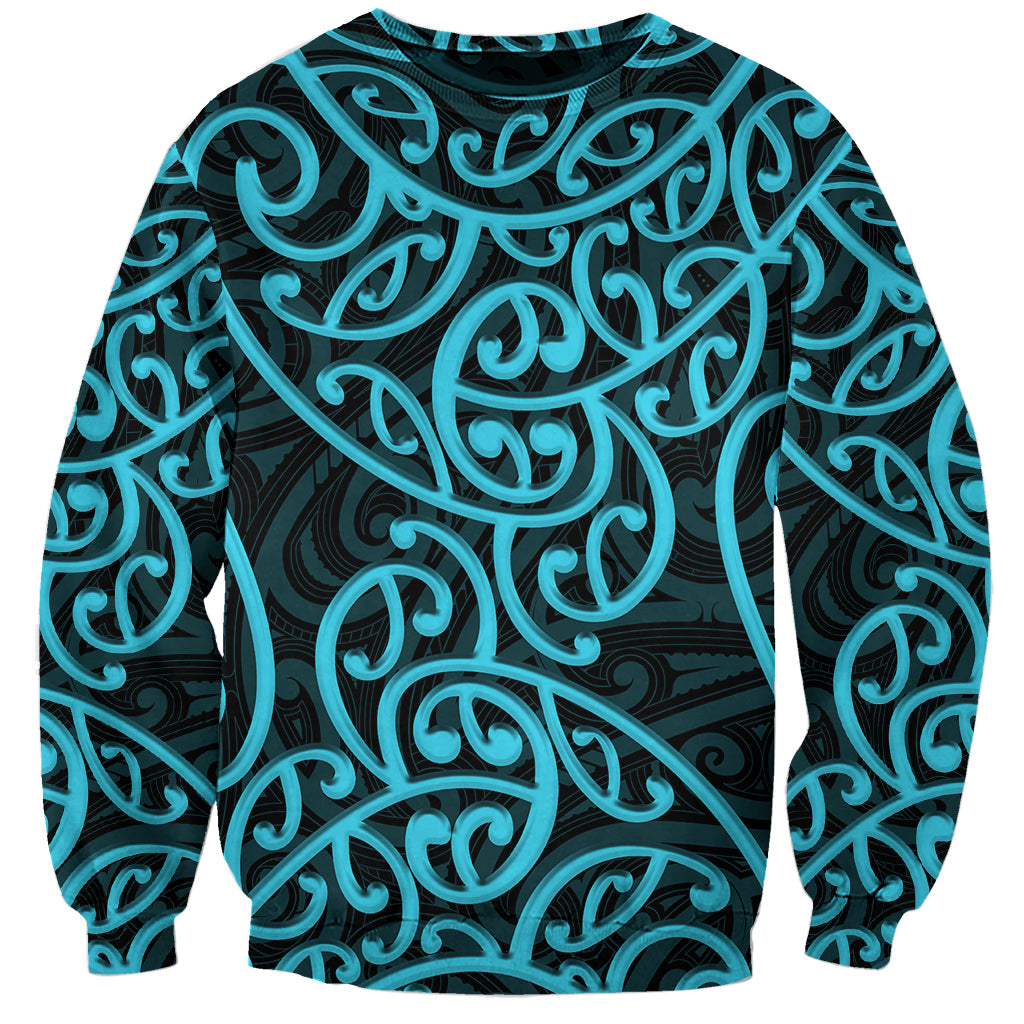 Unisex sweatshirt with dark background and turquoise Maori-style swirling pattern