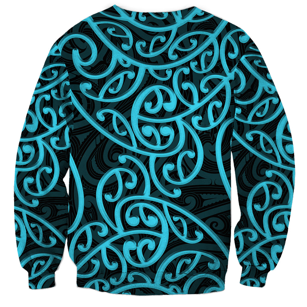 Unisex sweatshirt, full front, with dark background and turquoise Maori-style swirls