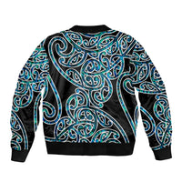 Bomber jacket with teal swirl pattern and ribbed hem, black base
