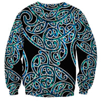 Unisex crewneck sweatshirt with all-over teal and green tribal swirl design on black