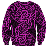 Unisex crewneck sweatshirt, all-over purple swirl Maori-style print with pink accents