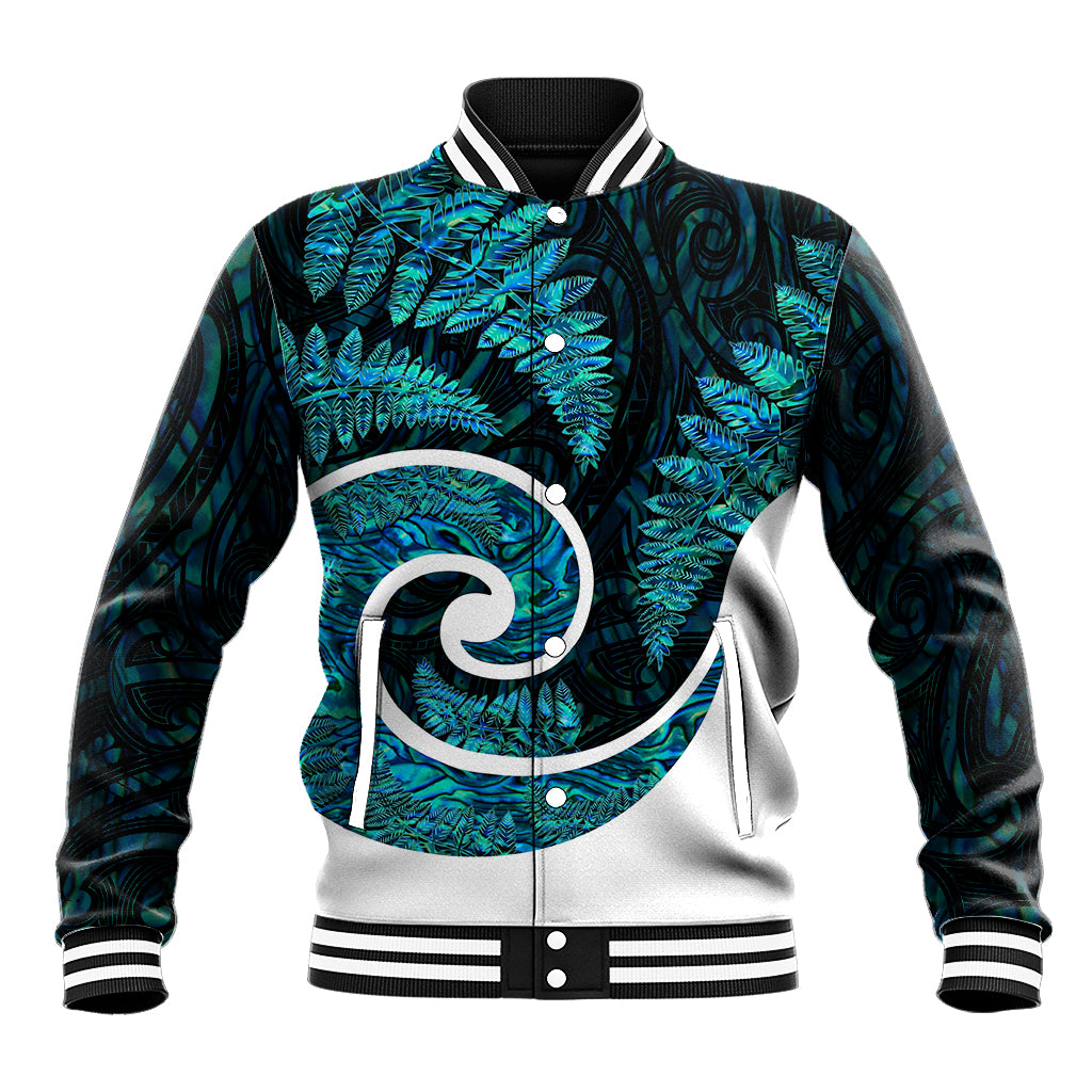 Green baseball jacket with teal fern and Maori swirl graphic, striped rib collar and cuffs.