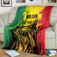 Personalized blanket with reggae grunge print, green left and red right with yellow