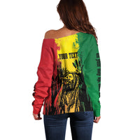 Off-shoulder sweater back view with 'YOUR TEXT' graphic, red/yellow/green long sleeves
