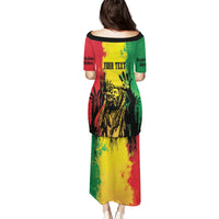 Back of multicolor long dress with wide neckline, short sleeves, and portrait graphic