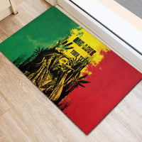 Personalized rubber doormat with green/red design, showing 'ONE LOVE' and 'YOUR TEXT'