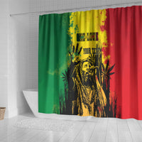 Reggae grunge shower curtain featuring central black-and-yellow portrait on green-yellow-red
