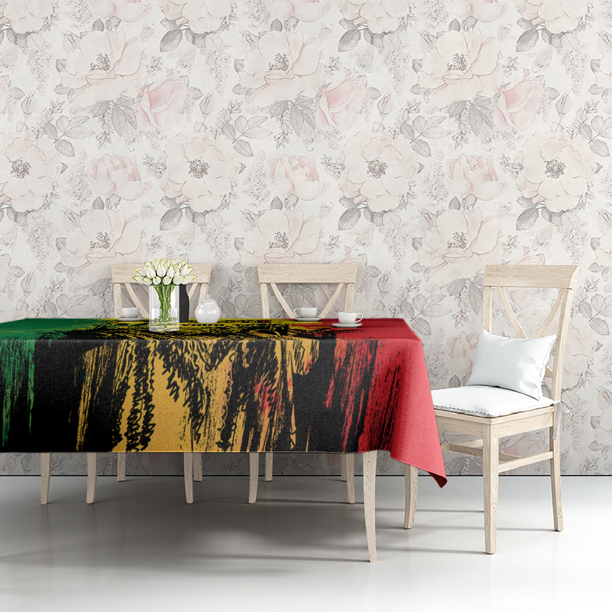 Tablecloth corner view with green and red grunge artwork over light dining set