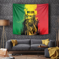 Reggae grunge personalized tapestry showing a central portrait with plants and bold green/red colors.