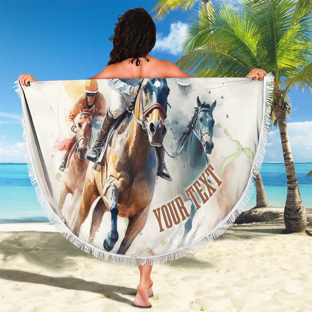 Round beach blanket with fringe edge, horse racing artwork, held up on sunny beach
