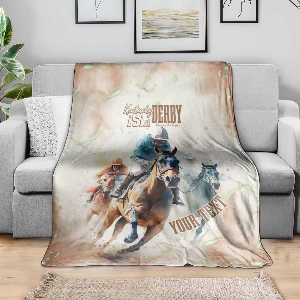 Beige horse racing blanket on sofa with Kentucky Derby 151st crest and “YOUR TEX…” text