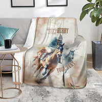 Beige horse racing blanket on chair with Derby 151st artwork and “YOUR TEX…” text