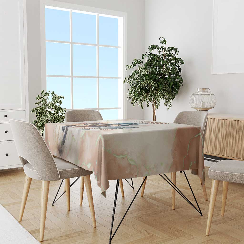 Beige horse-racing tablecloth covering a dining table with colorful illustration