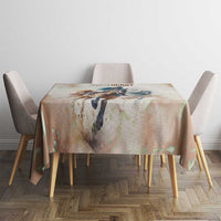 Beige horse-racing tablecloth on a small round table with colorful illustration