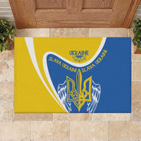 Yellow and blue rubber doormat with trident emblem and “Slava Ukraini” text