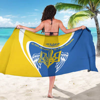 Ukraine-themed sarong worn as wrap skirt, blue and yellow Tryzub graphics