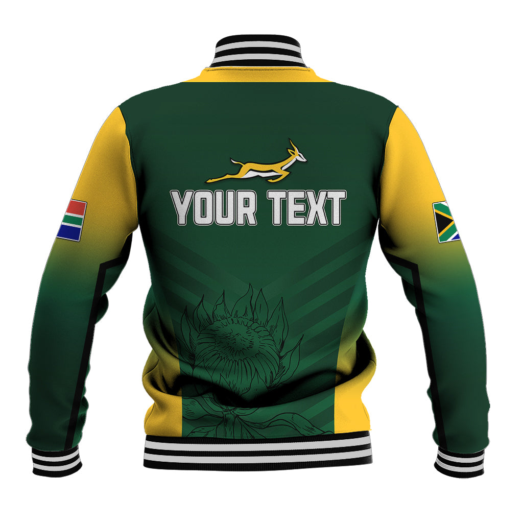 Green and yellow varsity baseball jacket with striped ribbed collar, back 'YOUR TEXT' print