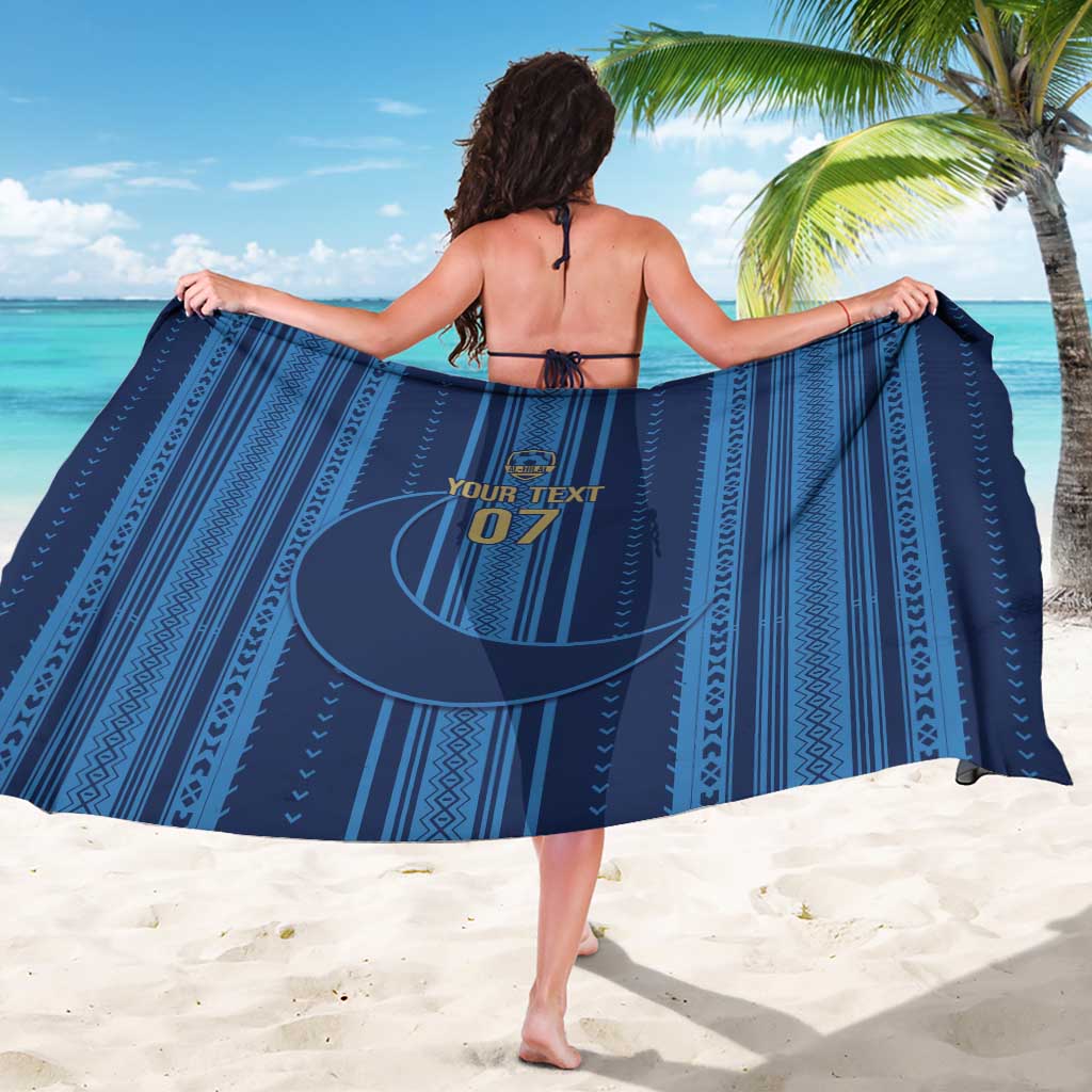 Dark blue sarong with geometric stripe pattern and centered crescent moon graphic (back)