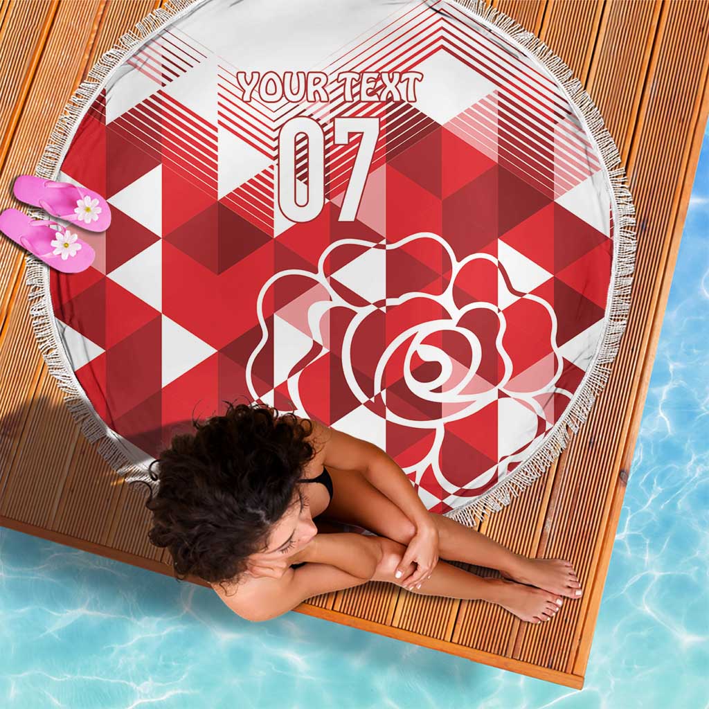 Round beach blanket in red and white geometric pattern, fringe trim, rose graphic and '07'